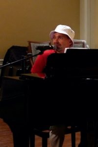 Cypress Cove IT Director Chris Stalbaum Performs for Residents on Lobby Piano