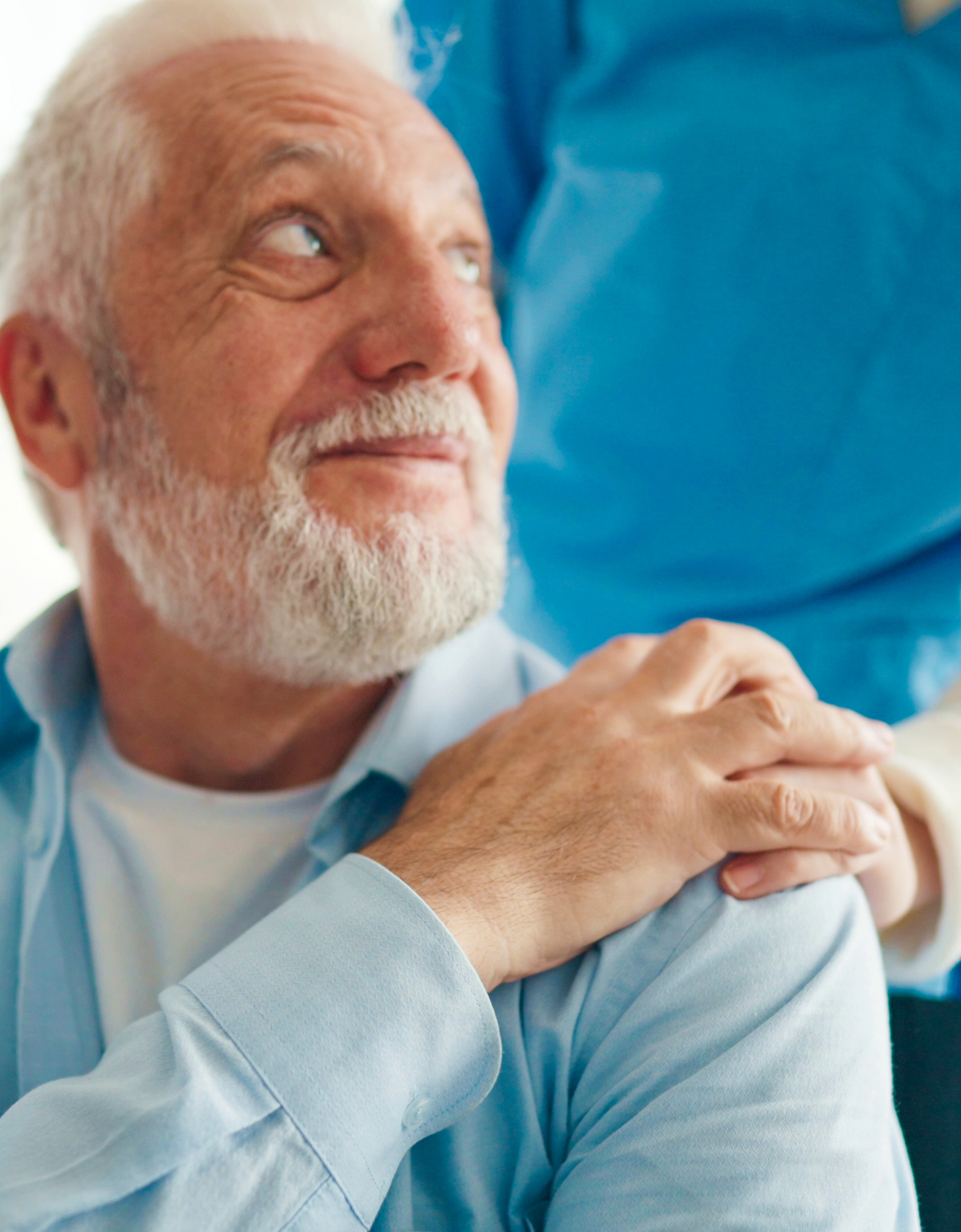 doctor-hold-caring-hands-on-shoulder-of-sad-elderly-patient-physician2